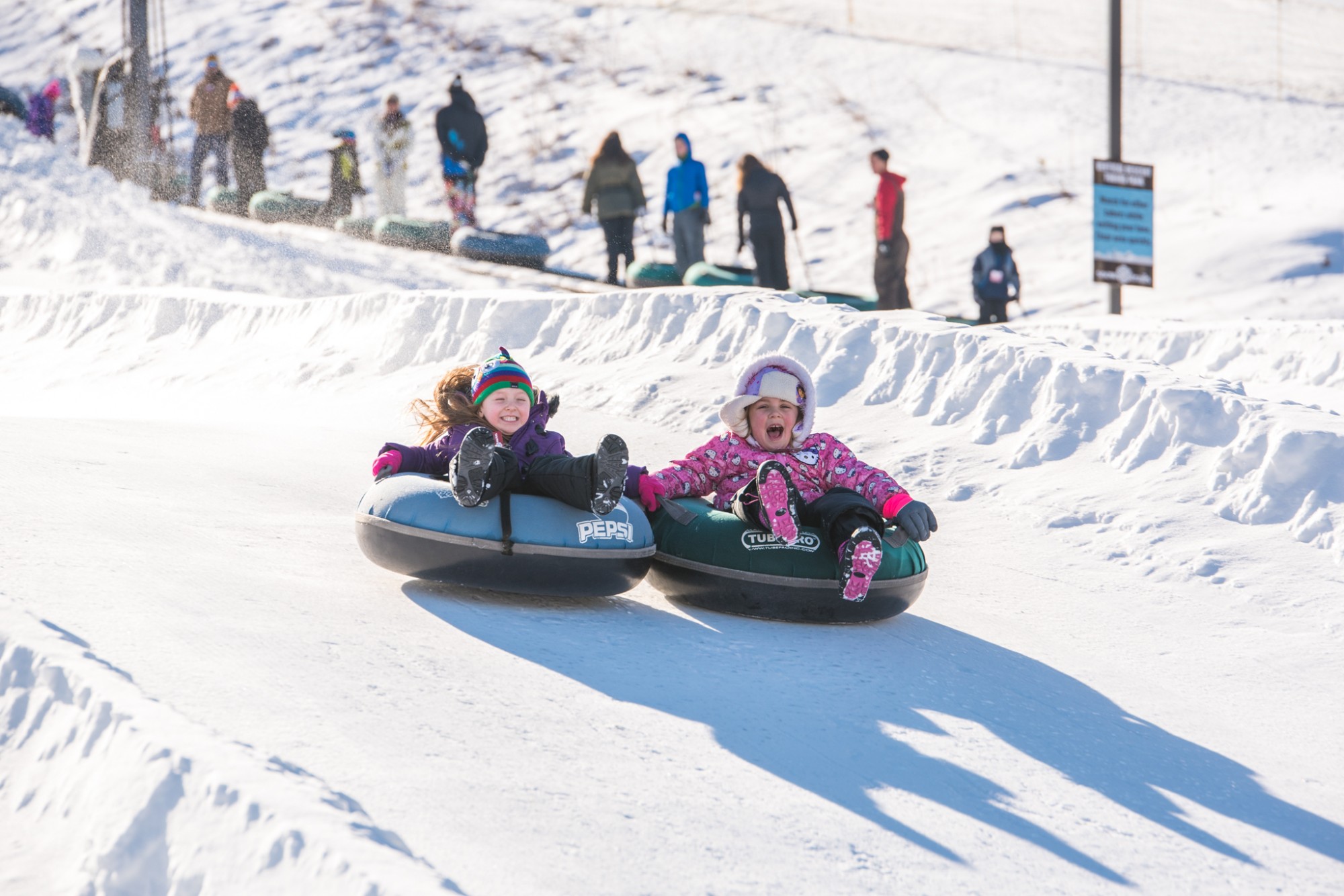 All smiles at Snow Trails Vertical Descent Tubing Park