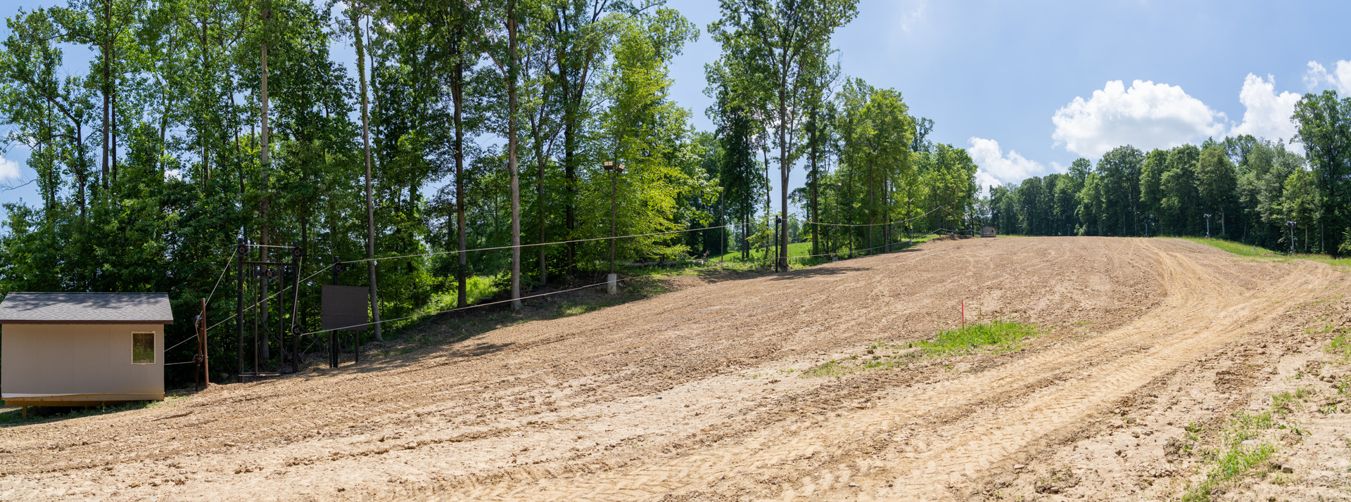 West Woods Regraded and shaved the knuckle along the path of The Woods Rope Tow to reduce downforce on guests being towed at Snow Trails Mansfield, Ohio