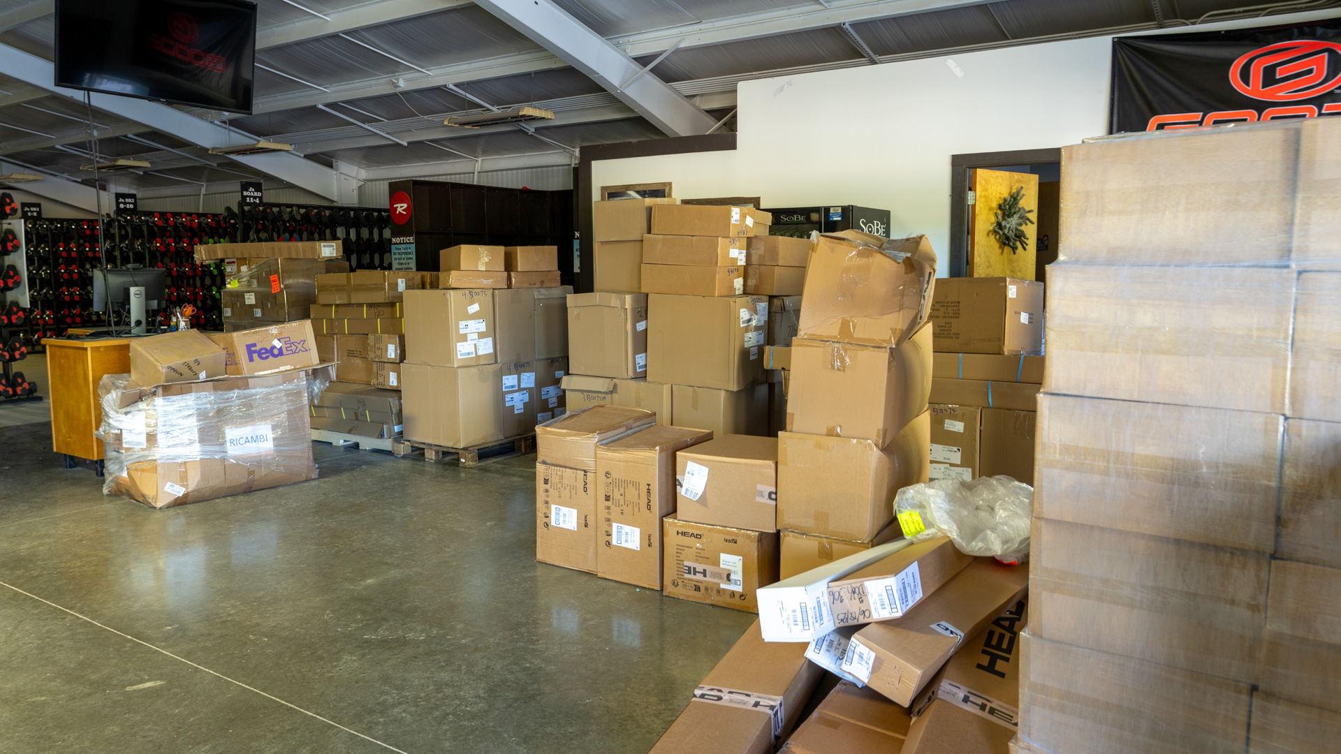 More Boxes of New Ski and Snowboard Equipment in Rental Center at Snow Trails Mansfield, Ohio