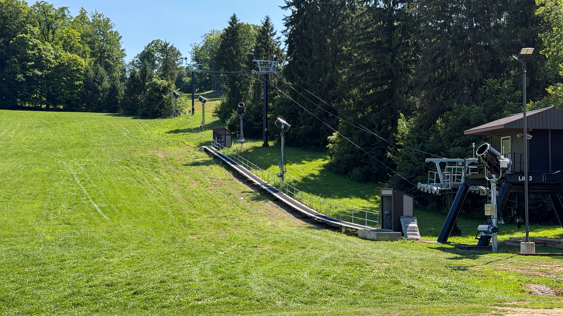 Beginners Conveyor Carpet reset after storm wash-out at Snow Trails Mansfield, Ohio