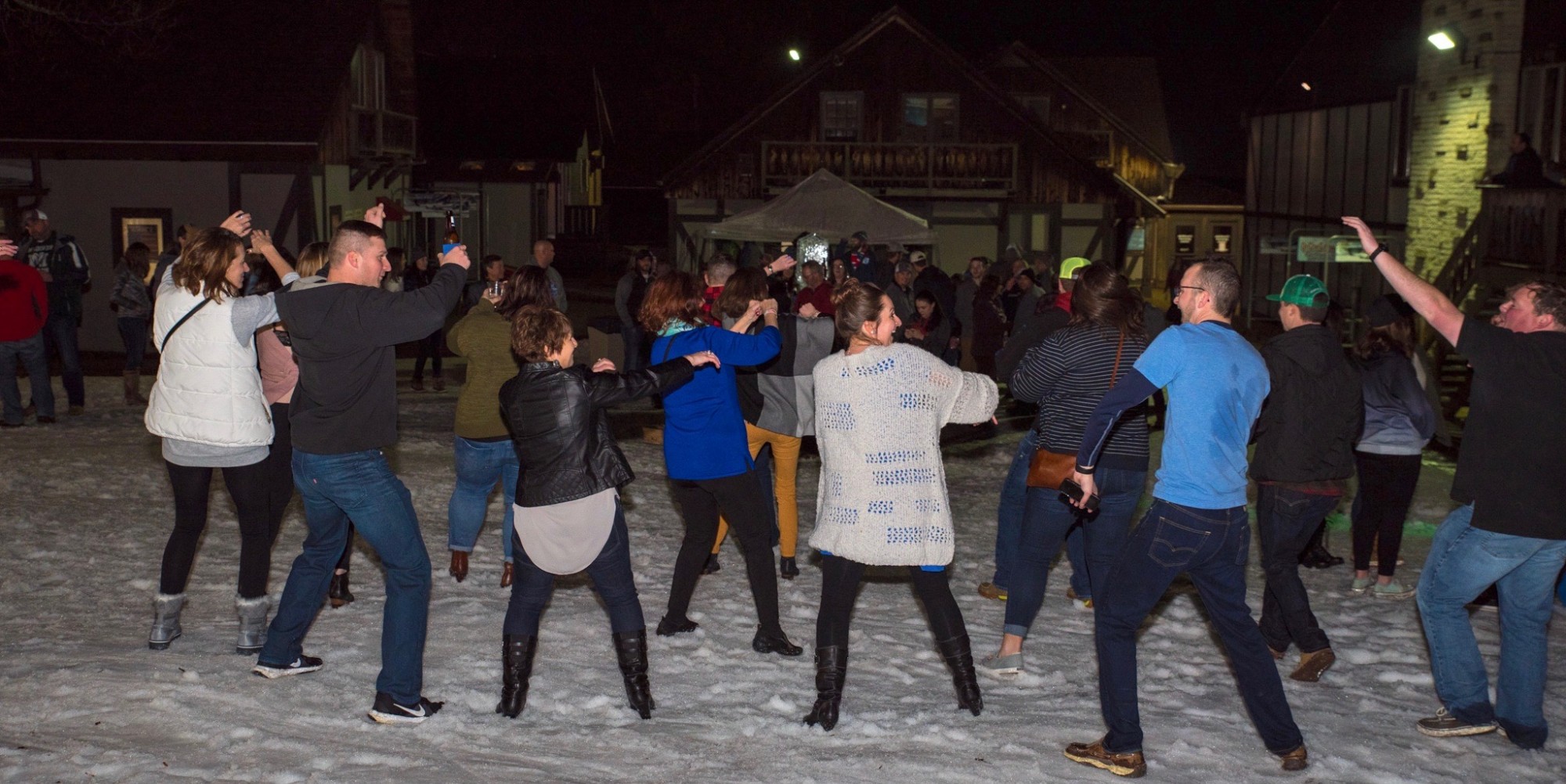 Dancing on-snow at the Party Plaza at Snow Trails