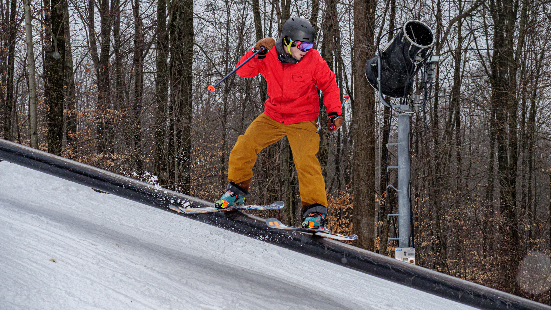 Skier sliding rail in Terrain Park