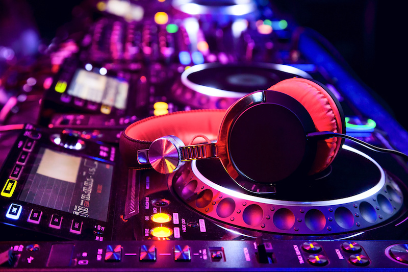 Photo of headphones on DJ turntable