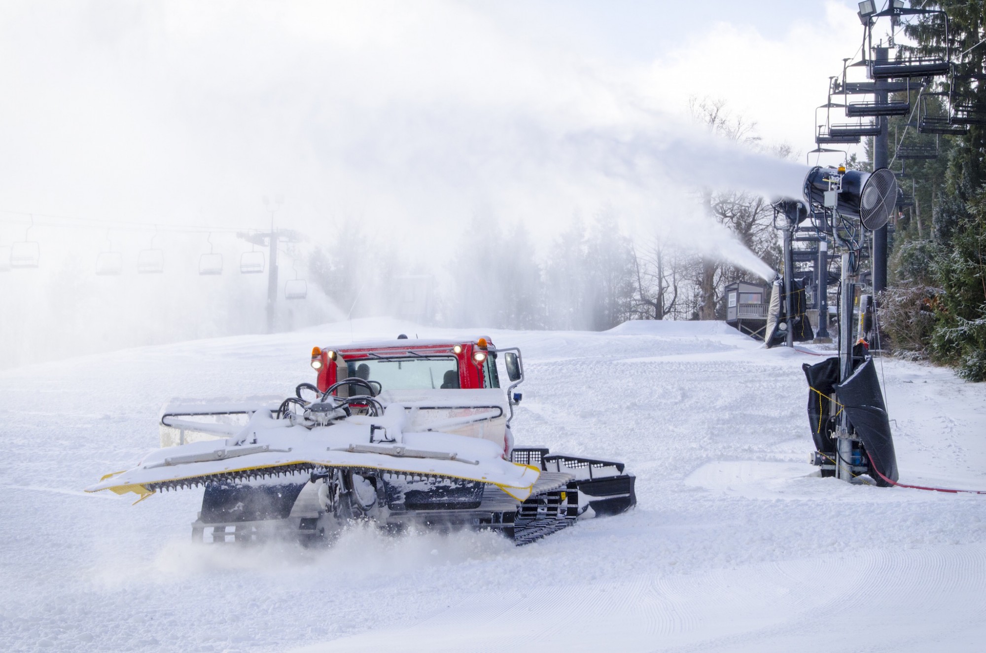 Snow Trails Pisten Bully Snow Cat shaping slopes for Opening Day