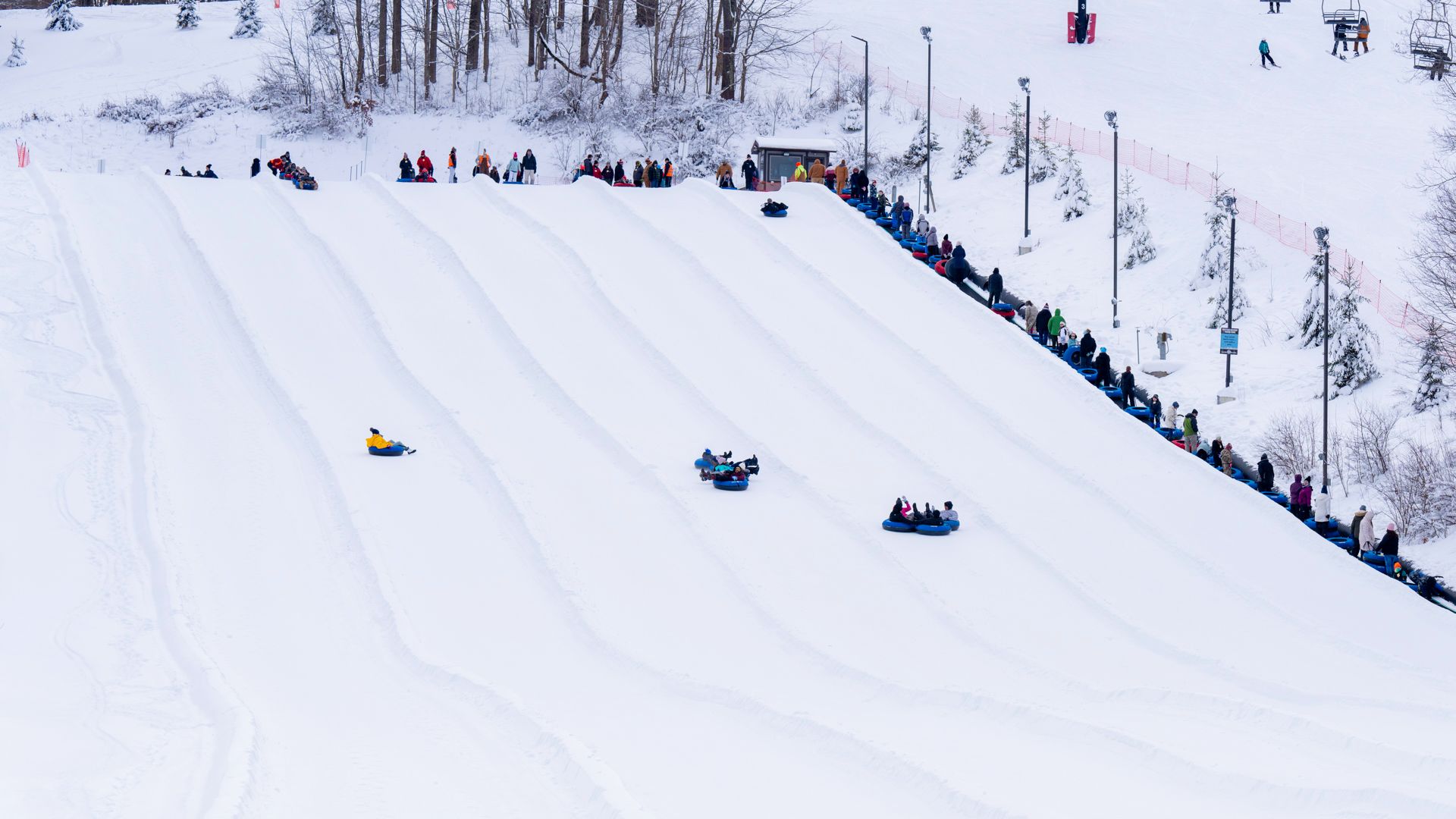 Vertical Descent</br>Tubing Park</br>Open Thurs.- Sun.</br>& Peak Days