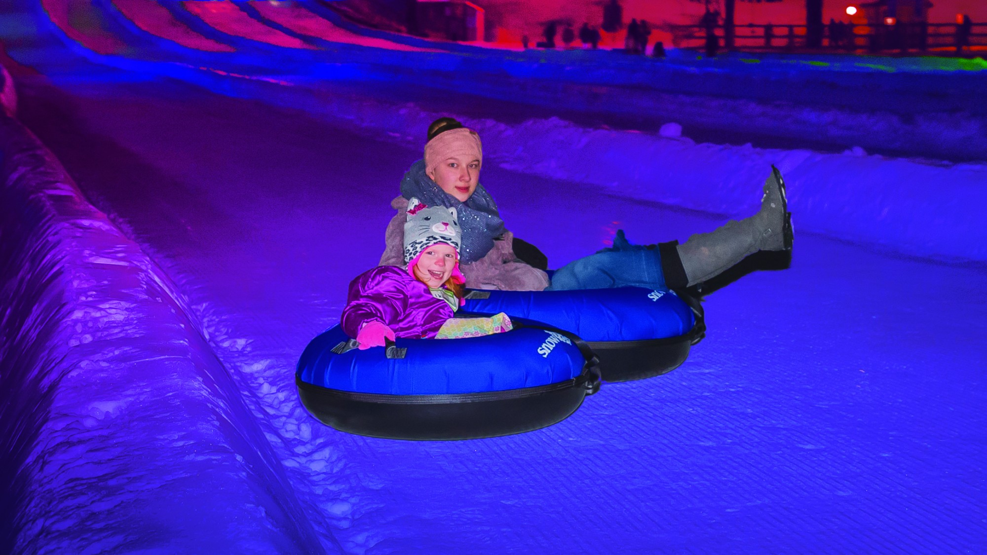 Glow Tubing during Will Tube For Food Under Glow Tubing LED Lights at Snow Trails Vertical Descent Tubing Park