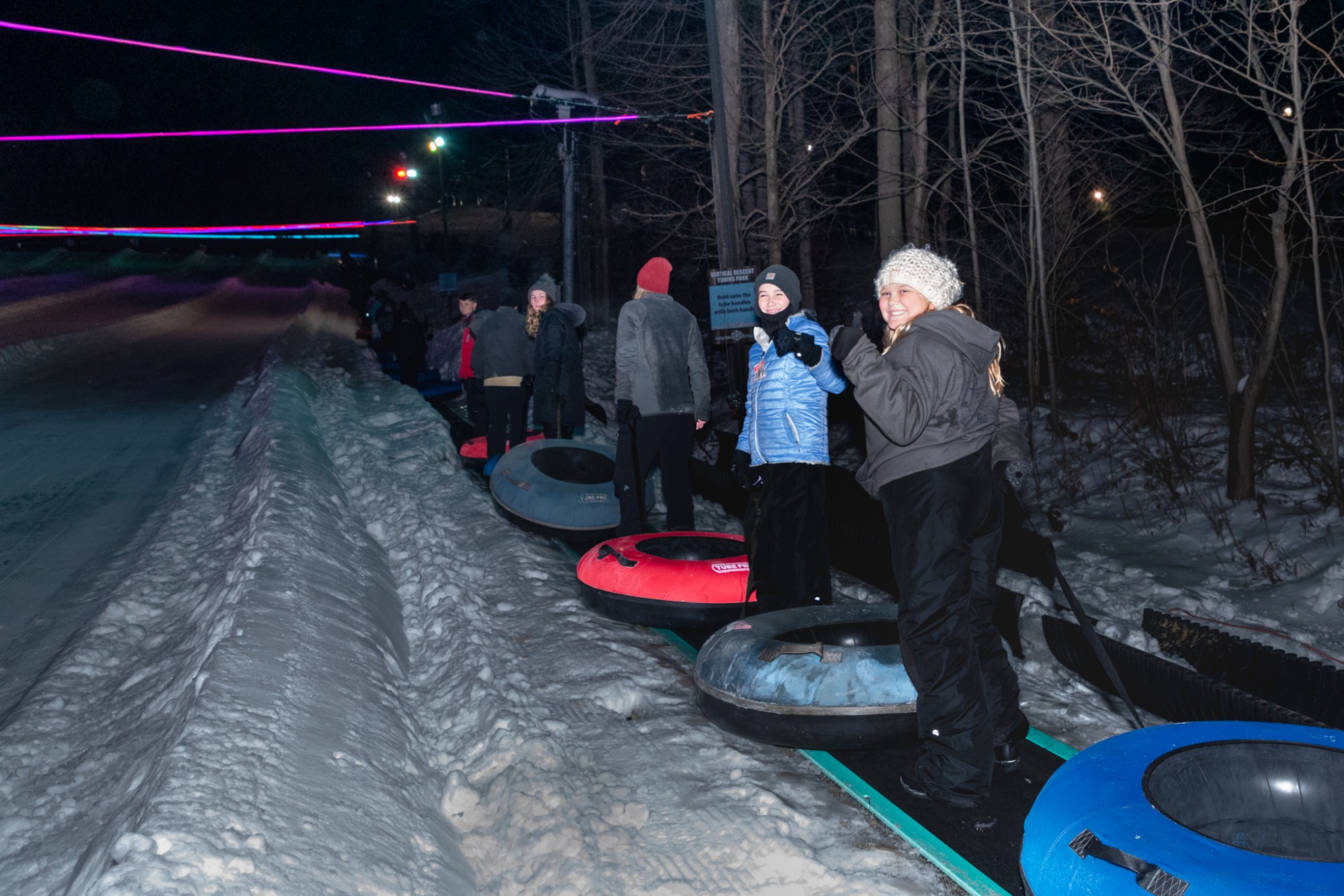 Conveyor Carpet Lift Ride during Will Tube For Food Under Glow Tubing LED Lights at Snow Trails Vertical Descent Tubing Park