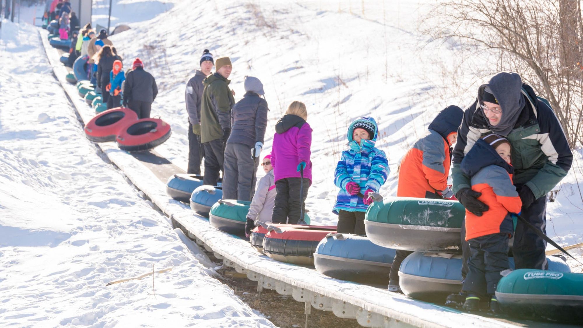 No walking uphill with Snow Trails Tubing Park Conveyor Carpet Lift Ride for Snow Tubing